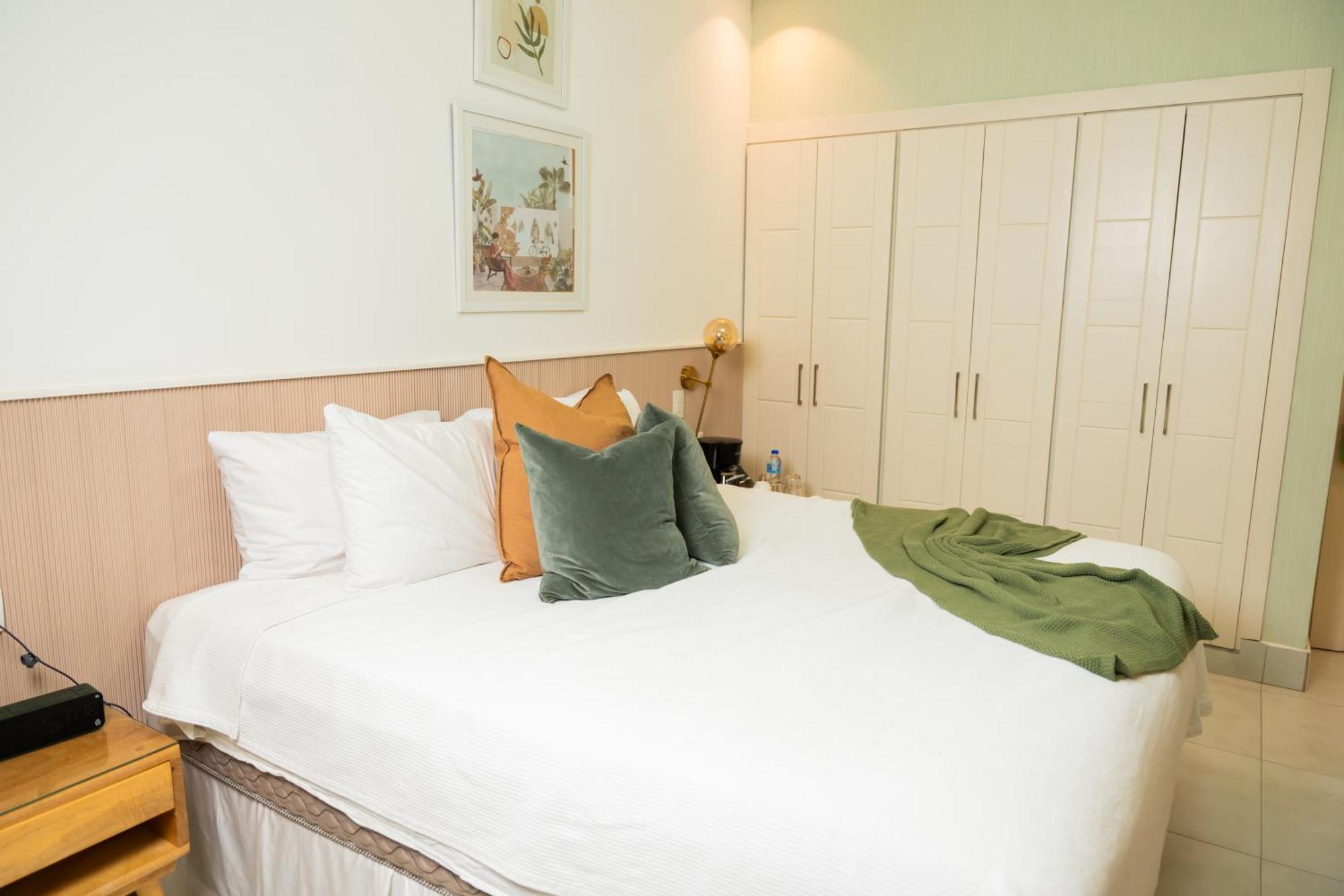Hotel Stay Here Suites 聖多明哥 外观 照片