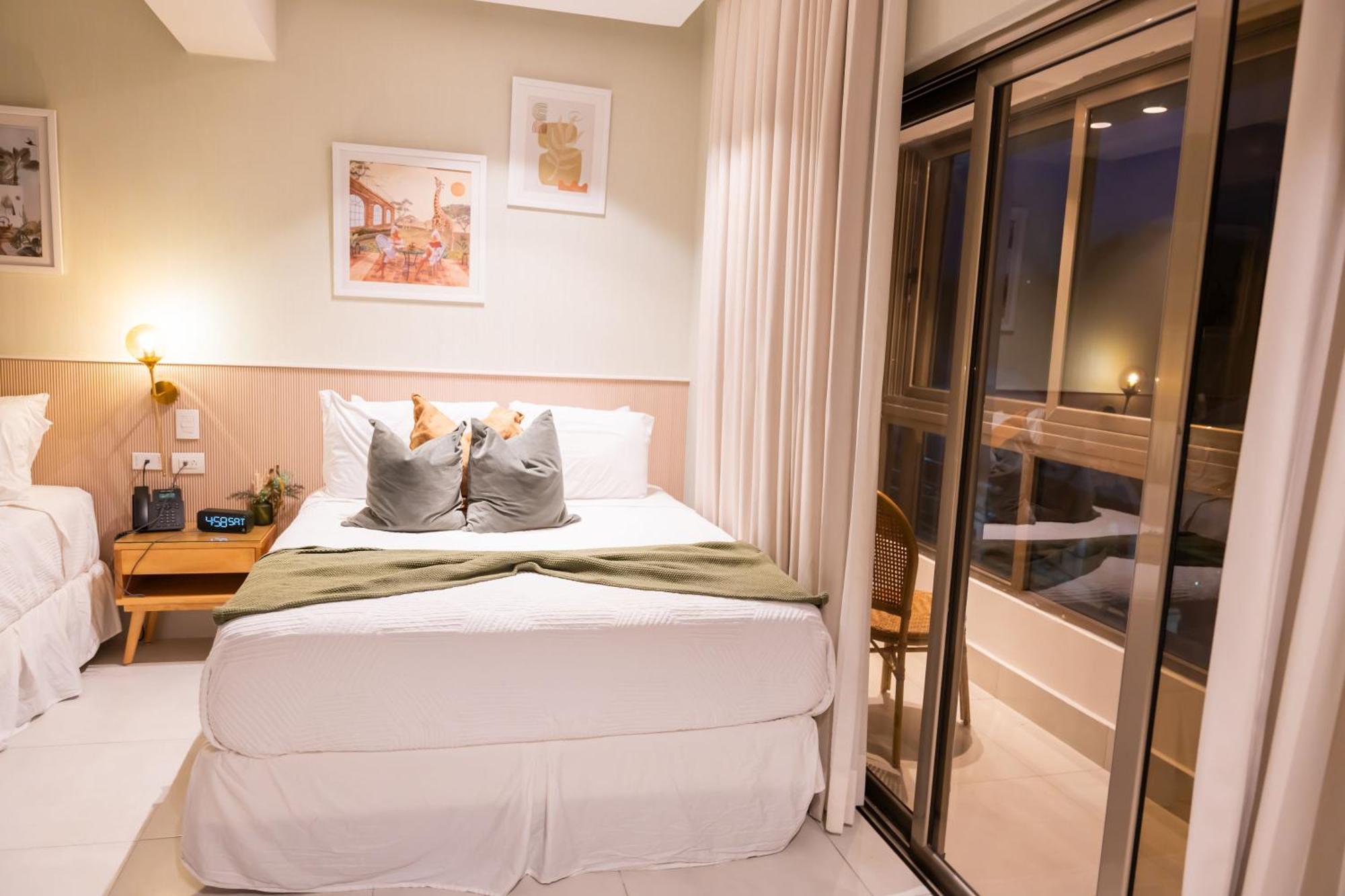 Hotel Stay Here Suites 聖多明哥 外观 照片