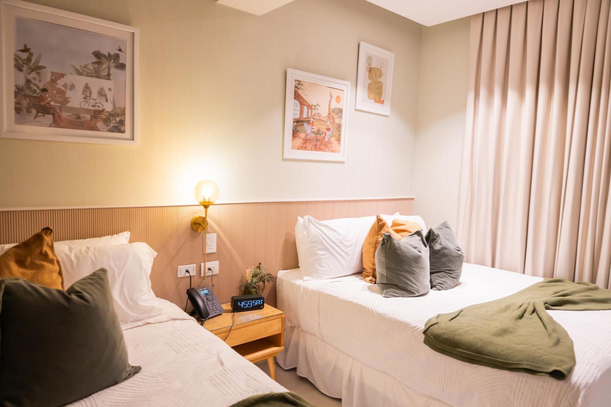 Hotel Stay Here Suites 聖多明哥 外观 照片