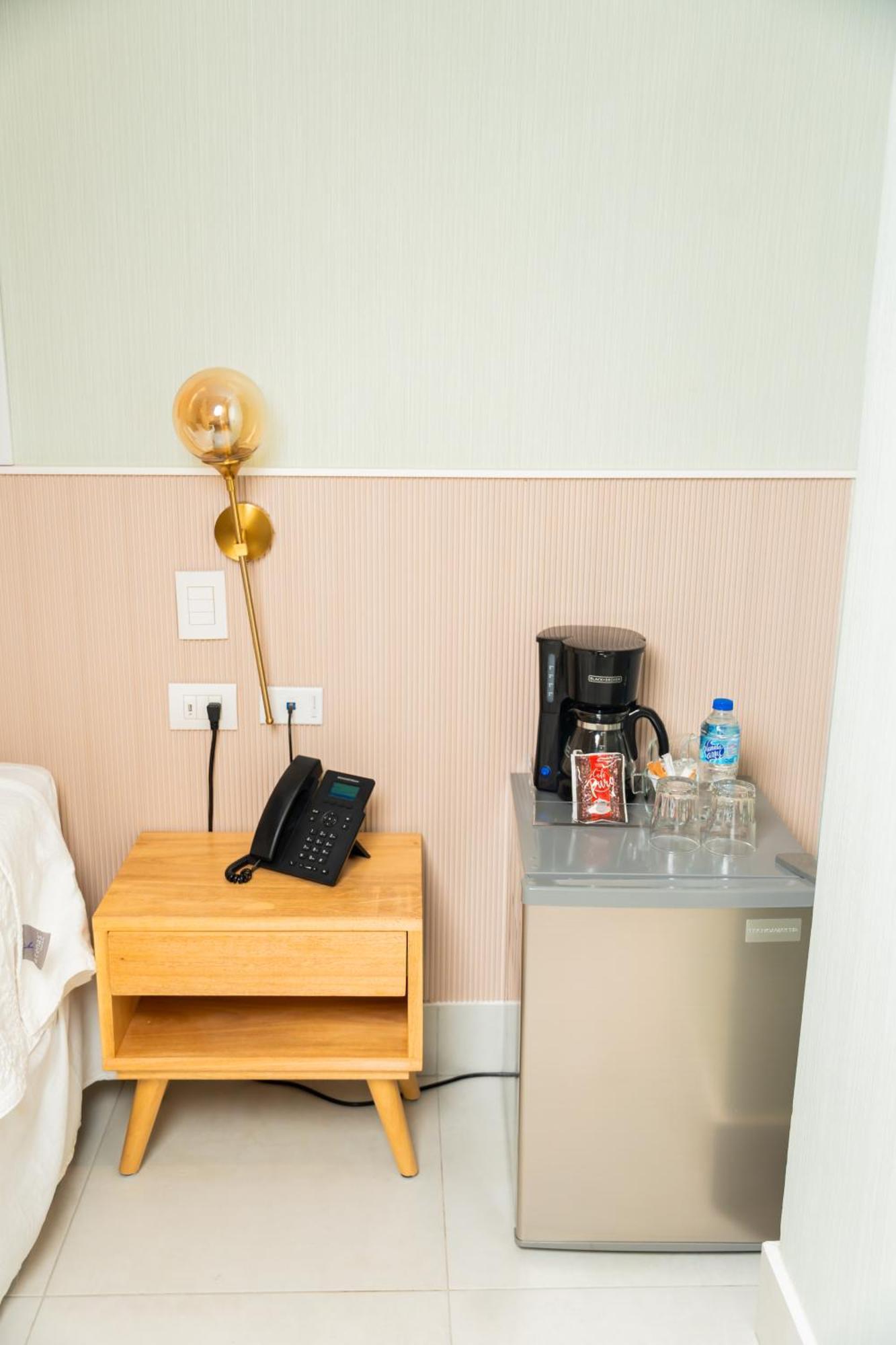 Hotel Stay Here Suites 聖多明哥 外观 照片