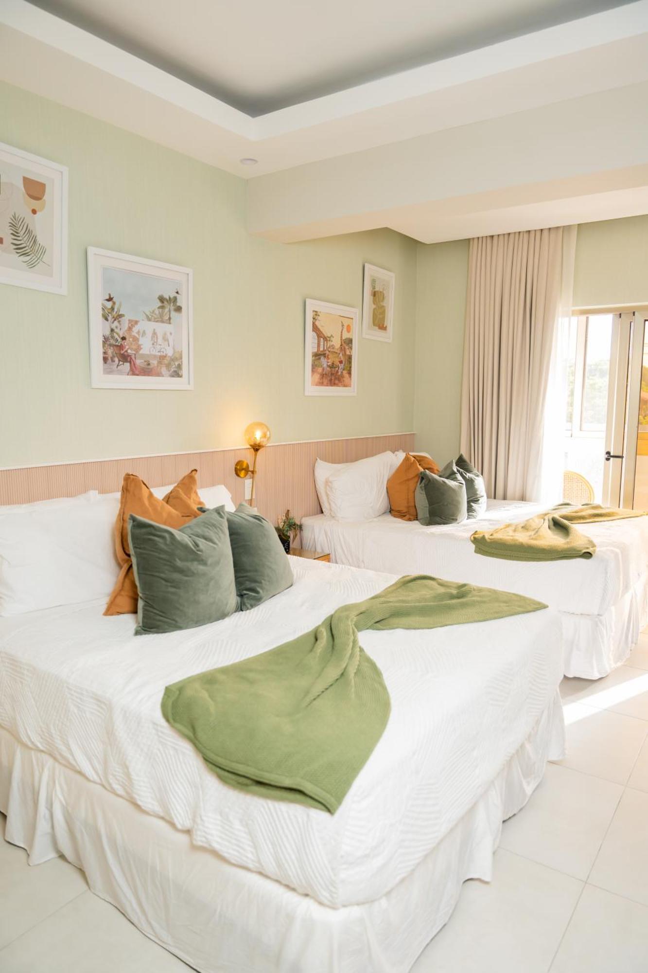 Hotel Stay Here Suites 聖多明哥 外观 照片