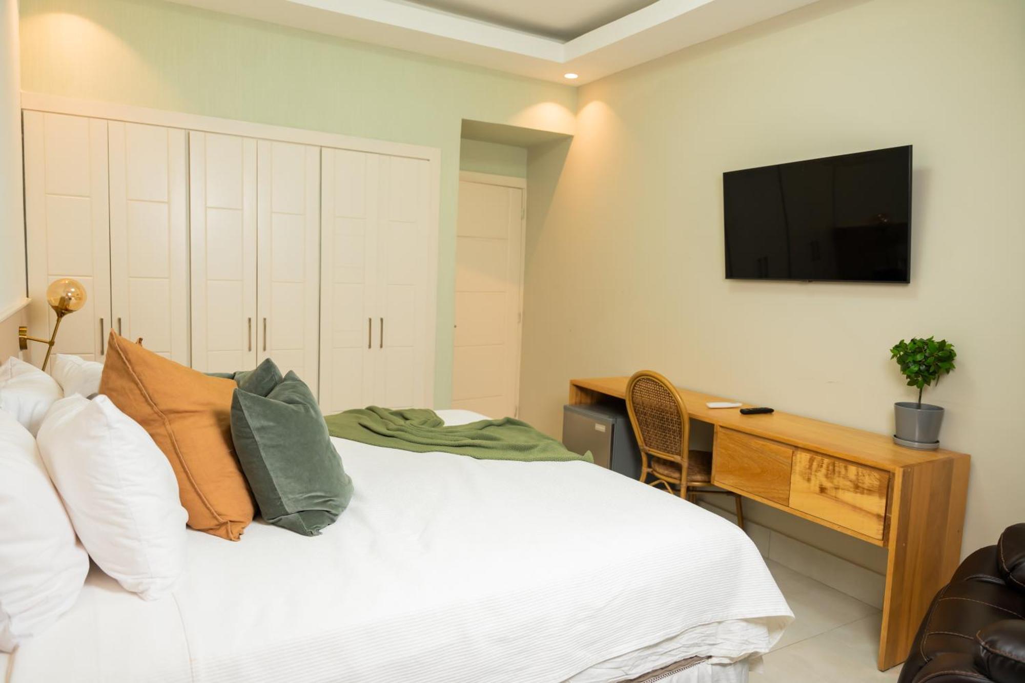 Hotel Stay Here Suites 聖多明哥 外观 照片