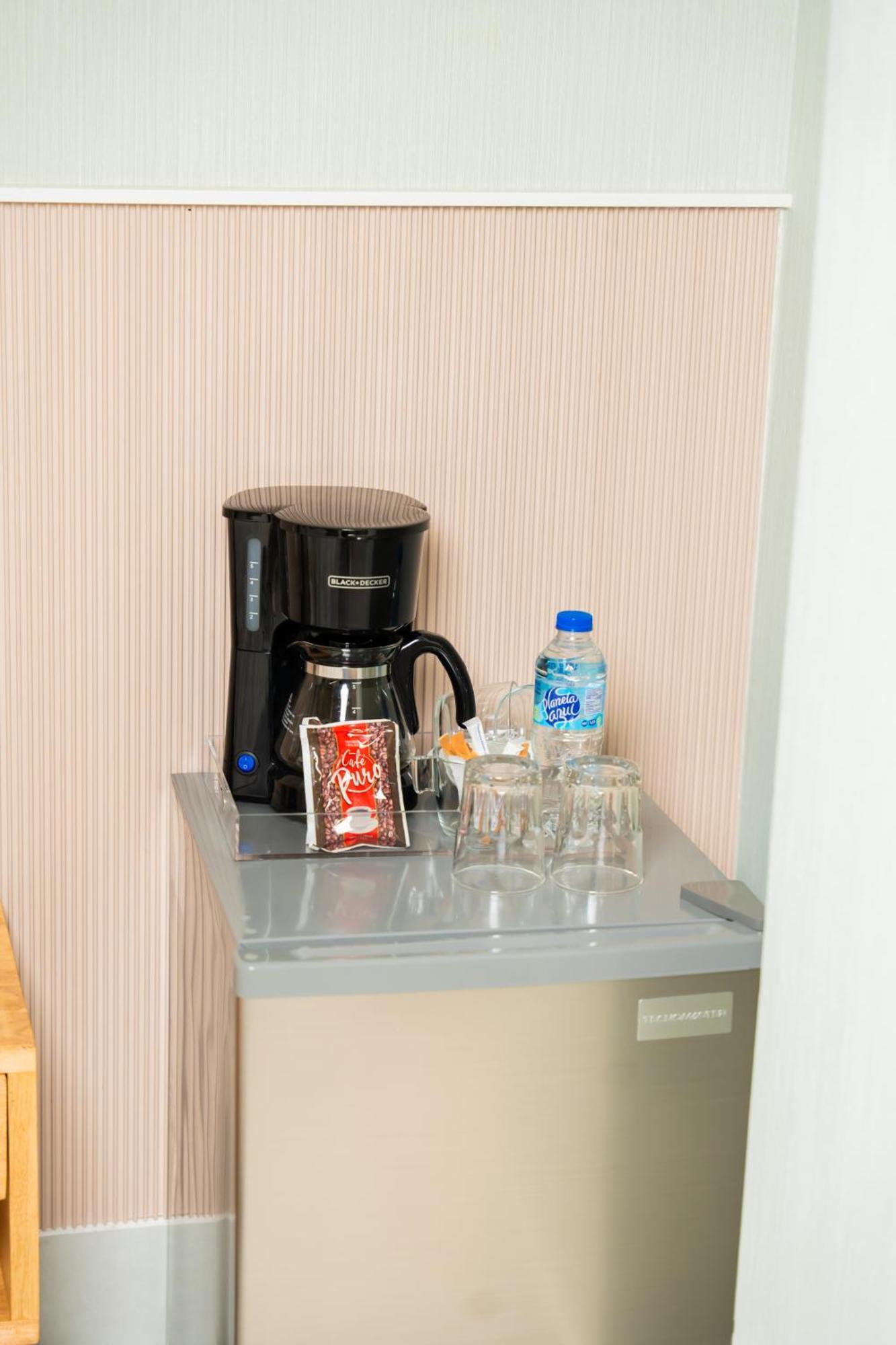 Hotel Stay Here Suites 聖多明哥 外观 照片