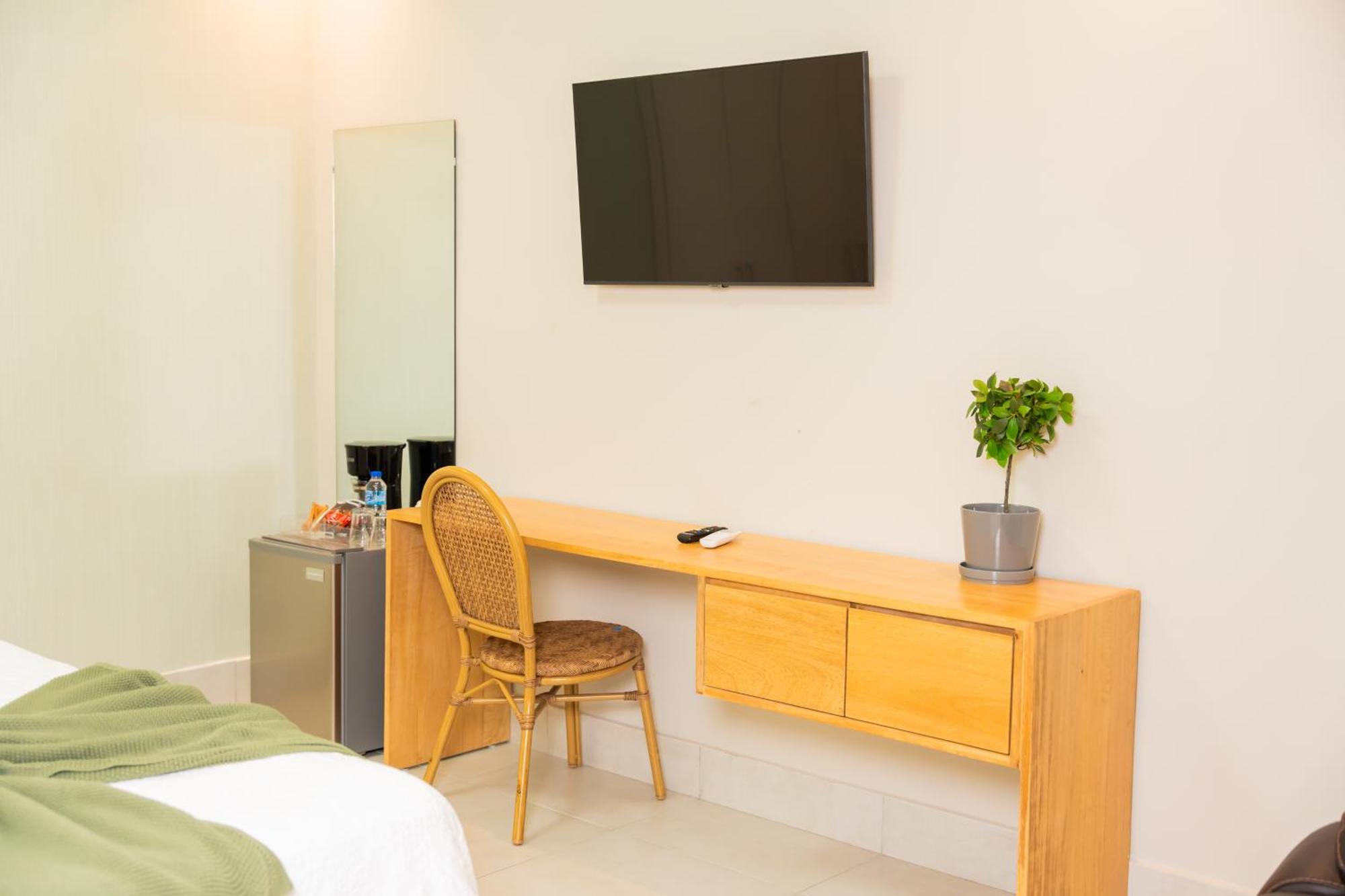 Hotel Stay Here Suites 聖多明哥 外观 照片