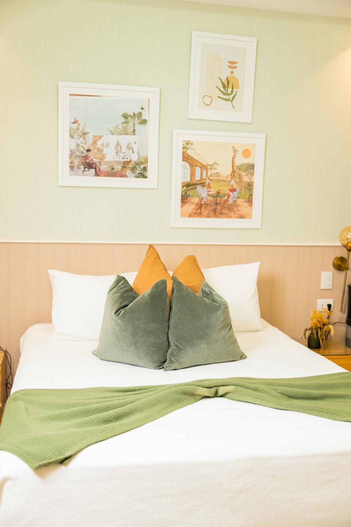 Hotel Stay Here Suites 聖多明哥 外观 照片