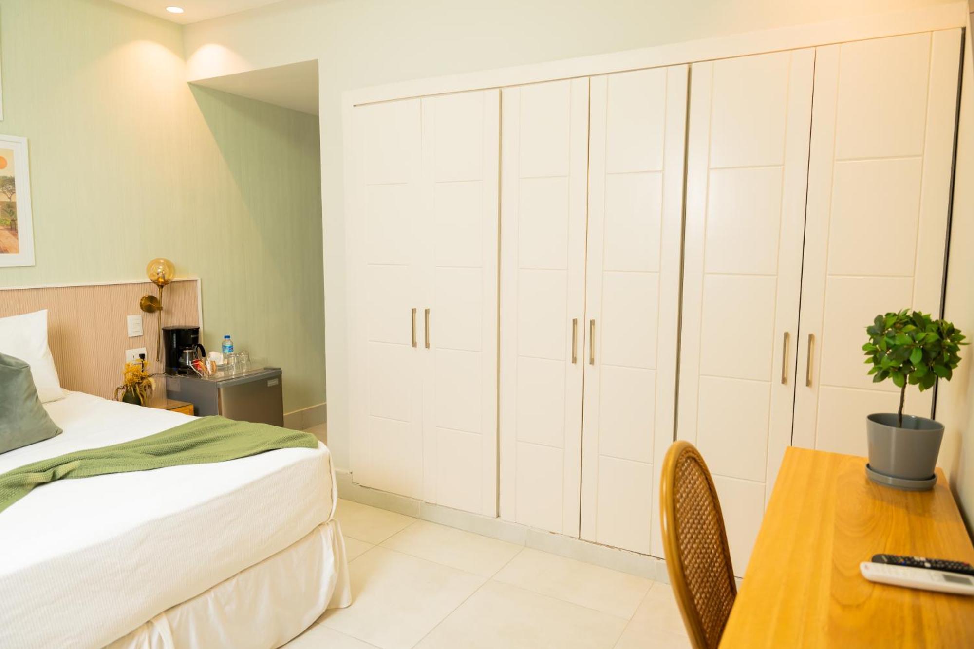 Hotel Stay Here Suites 聖多明哥 外观 照片