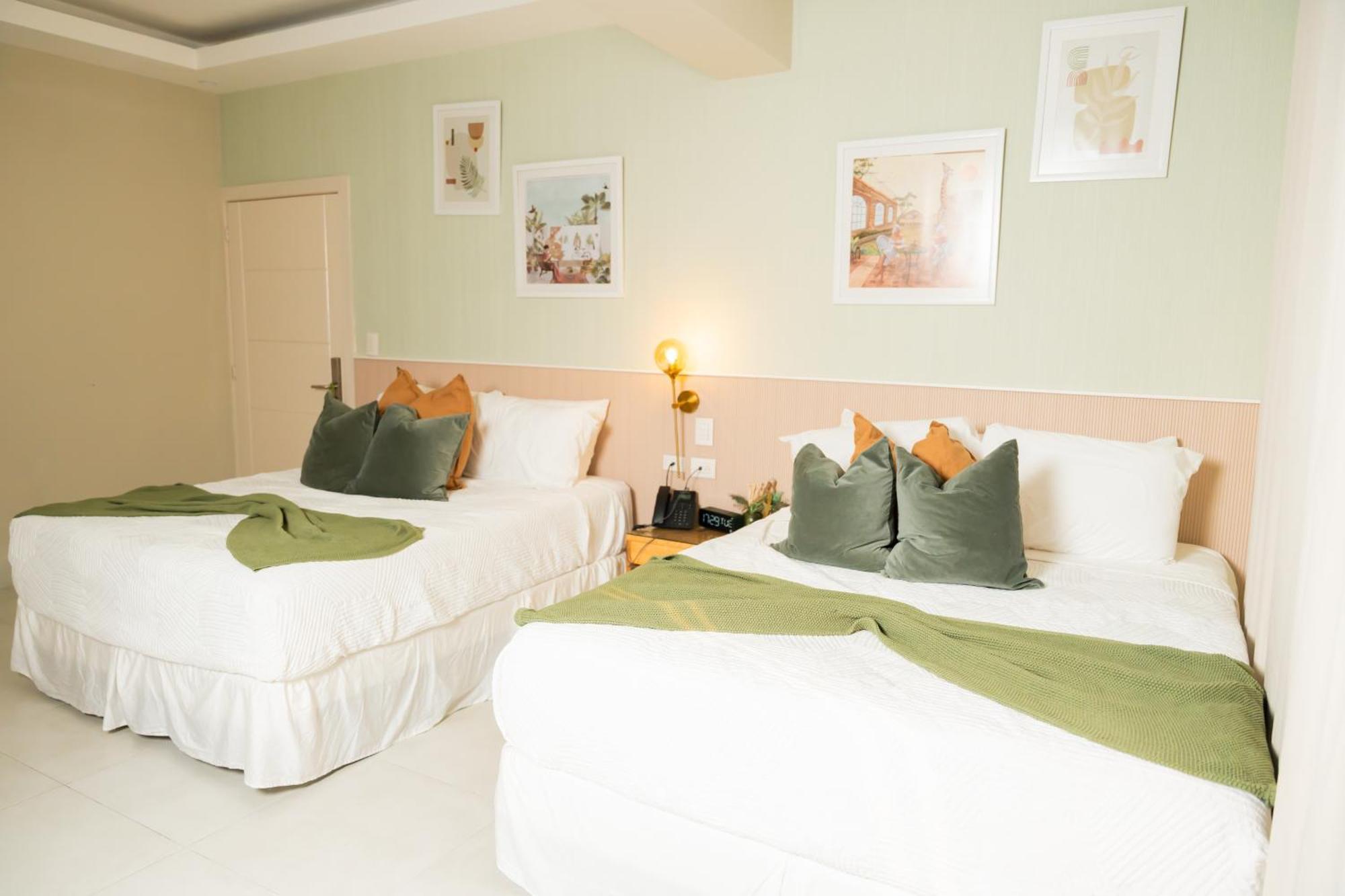 Hotel Stay Here Suites 聖多明哥 外观 照片