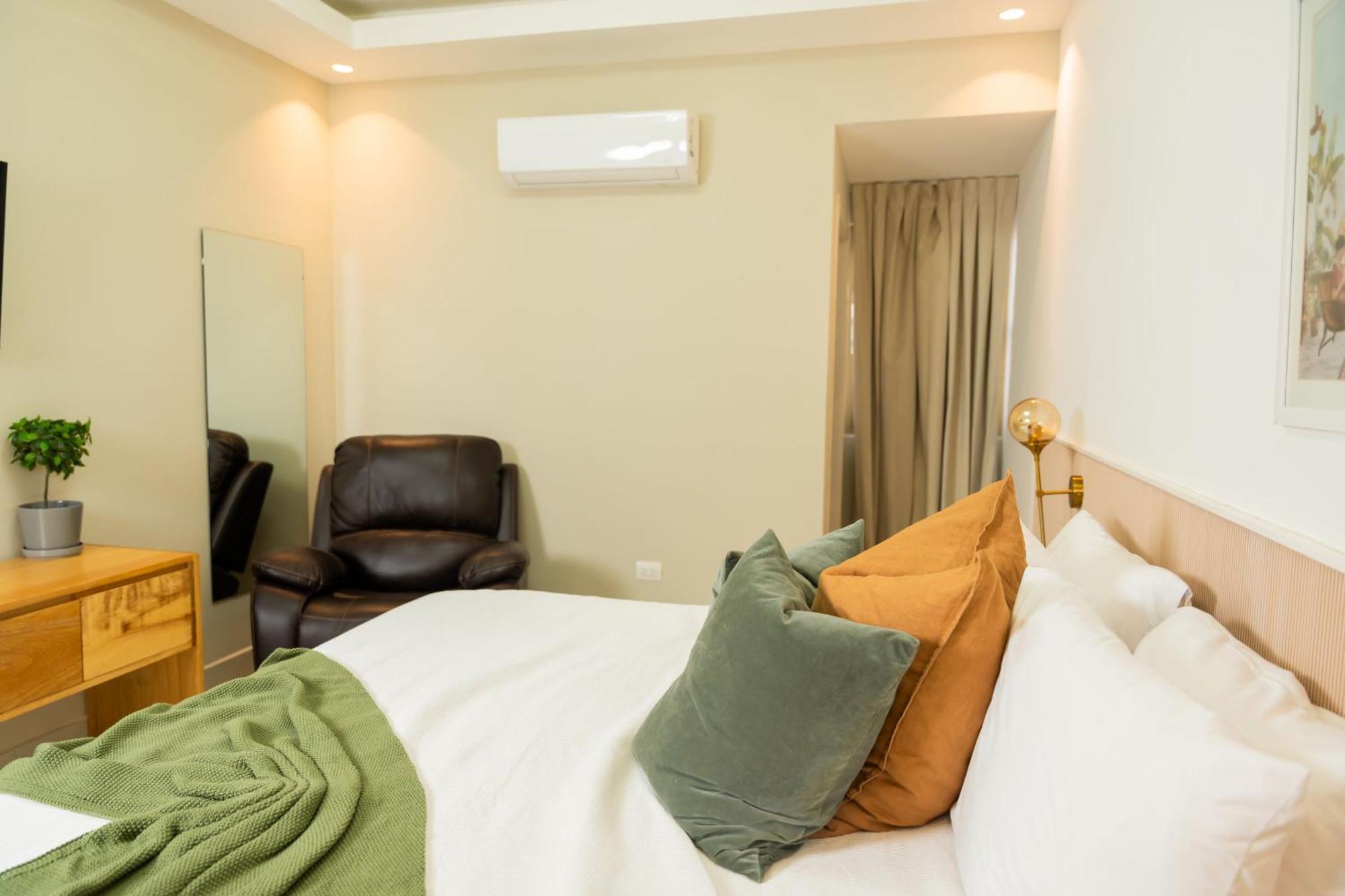 Hotel Stay Here Suites 聖多明哥 外观 照片