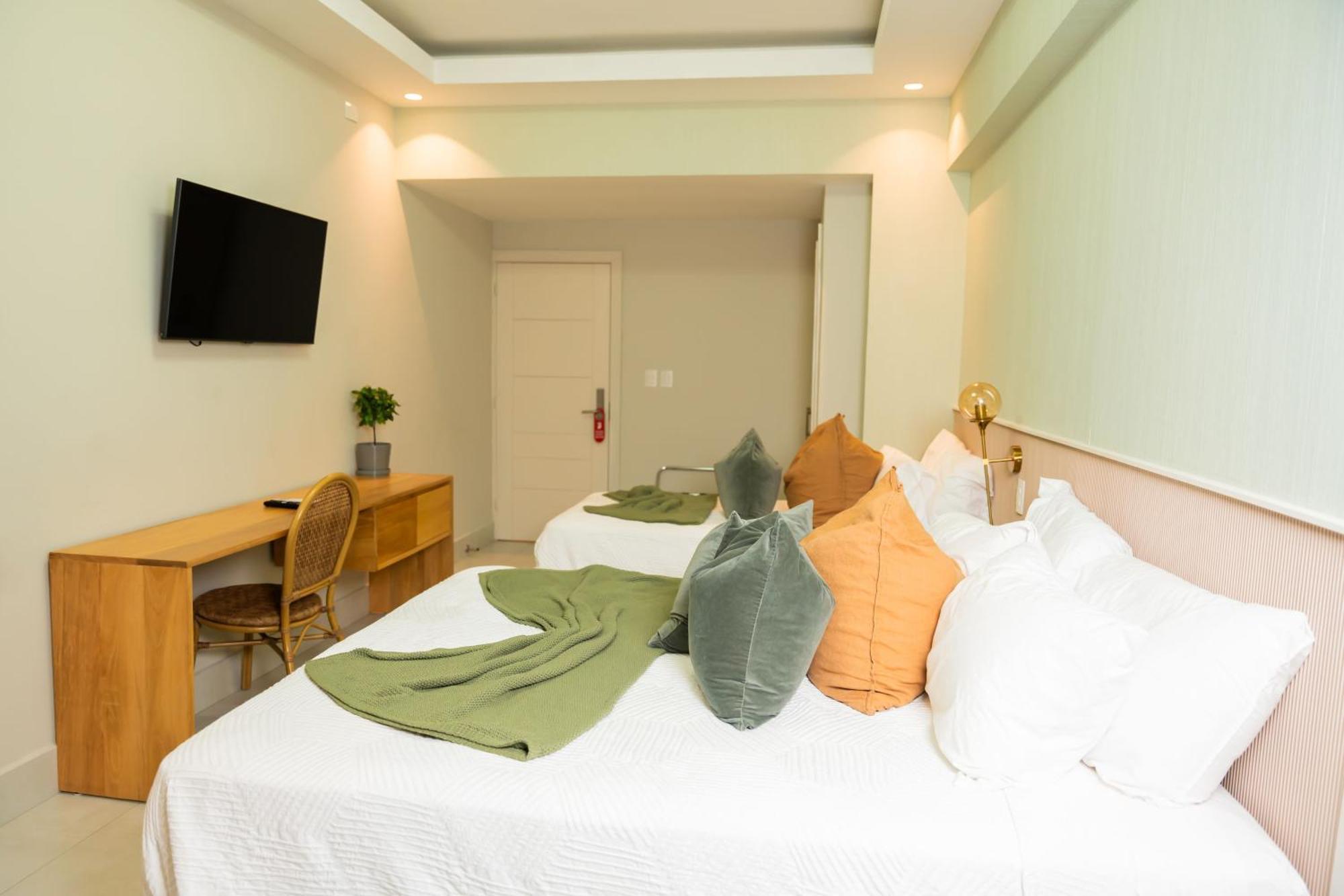 Hotel Stay Here Suites 聖多明哥 外观 照片