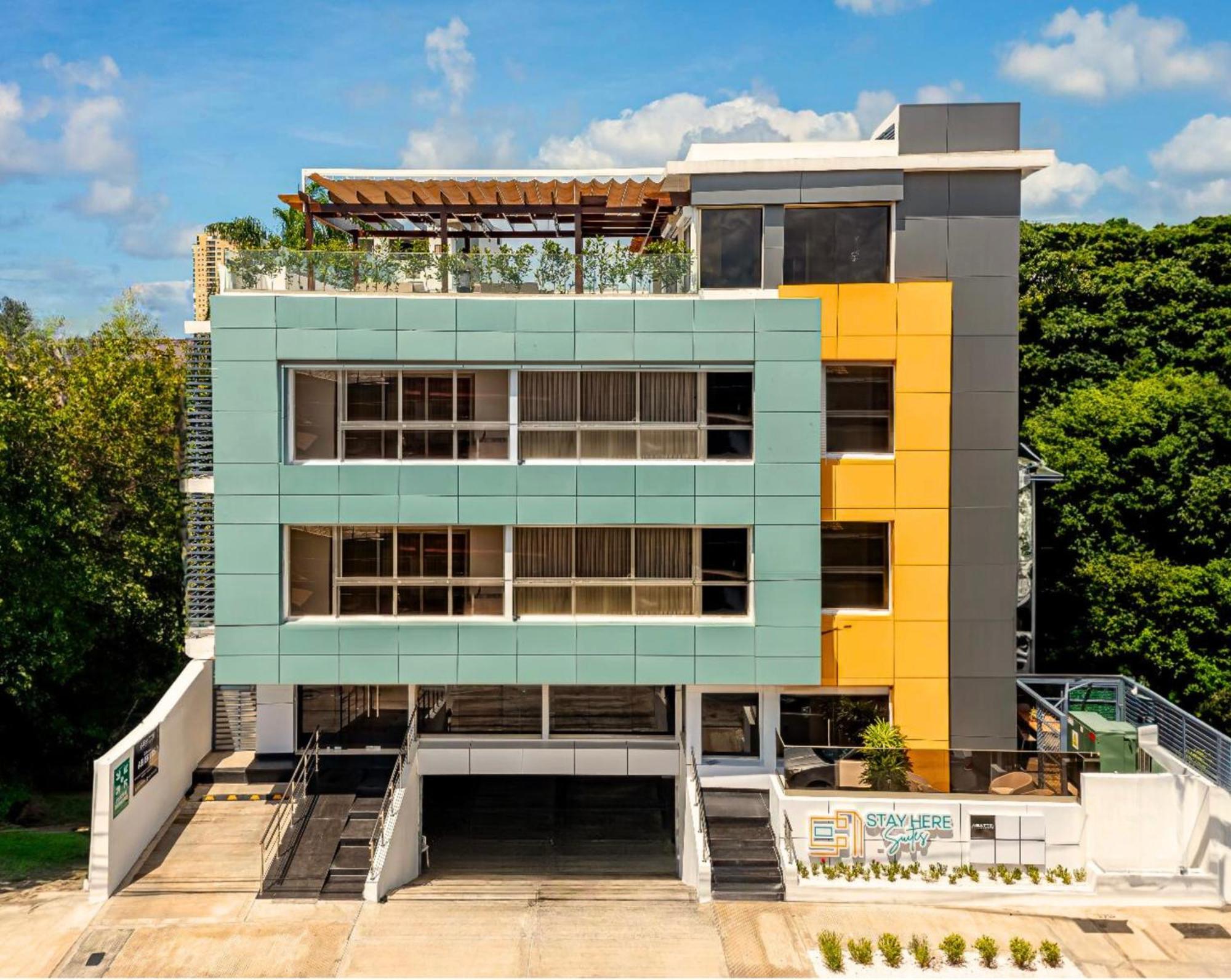 Hotel Stay Here Suites 聖多明哥 外观 照片