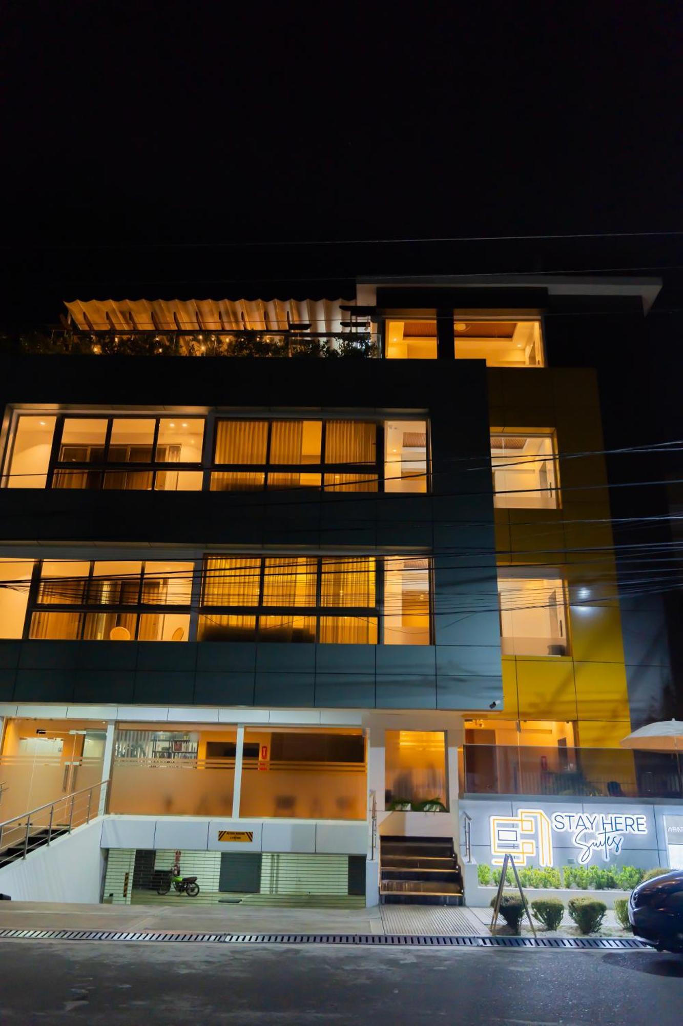Hotel Stay Here Suites 聖多明哥 外观 照片