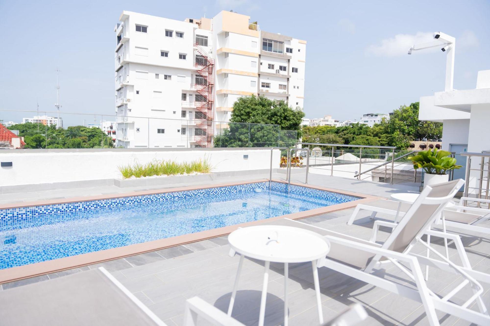 Hotel Stay Here Suites 聖多明哥 外观 照片
