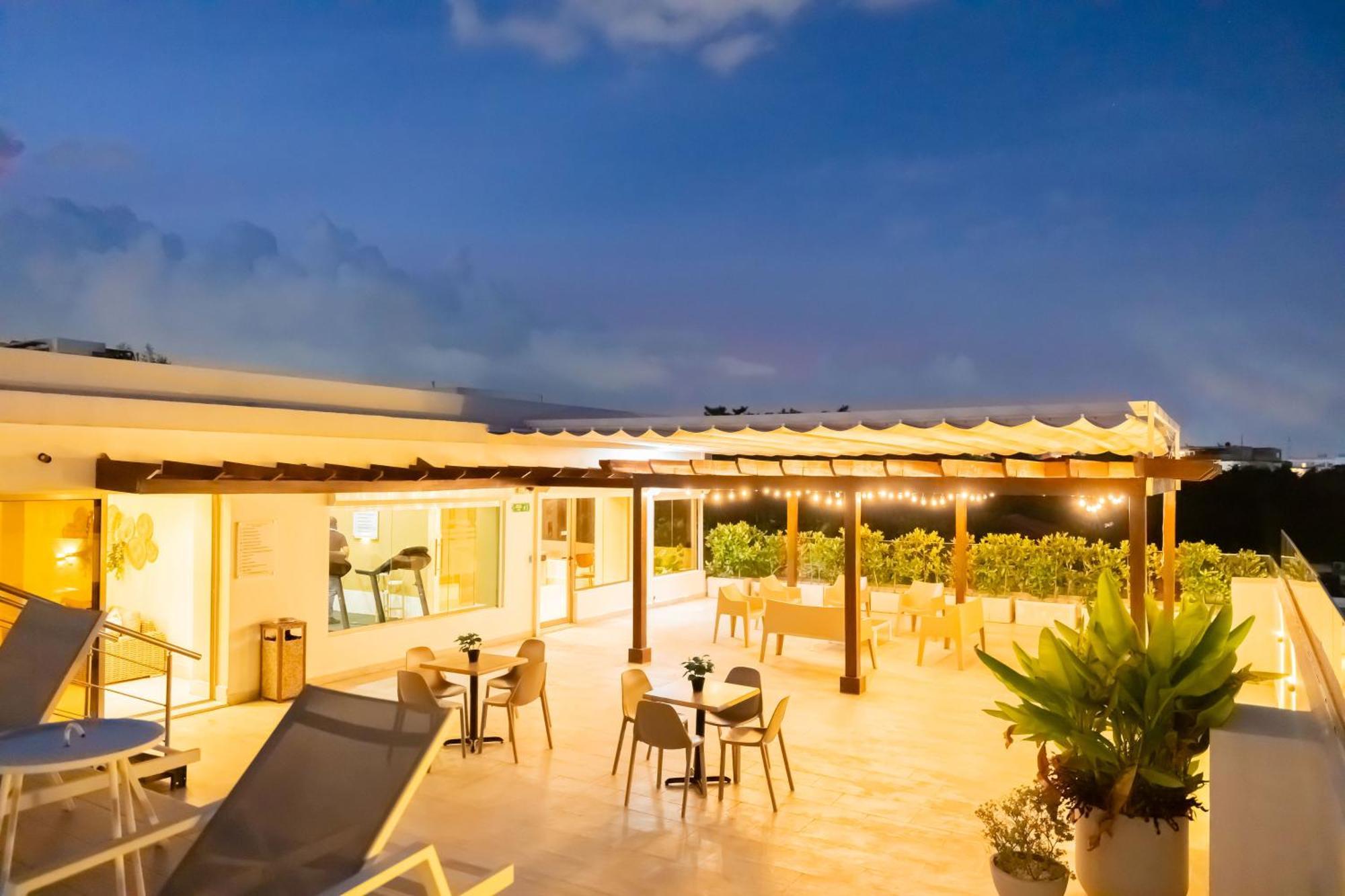 Hotel Stay Here Suites 聖多明哥 外观 照片