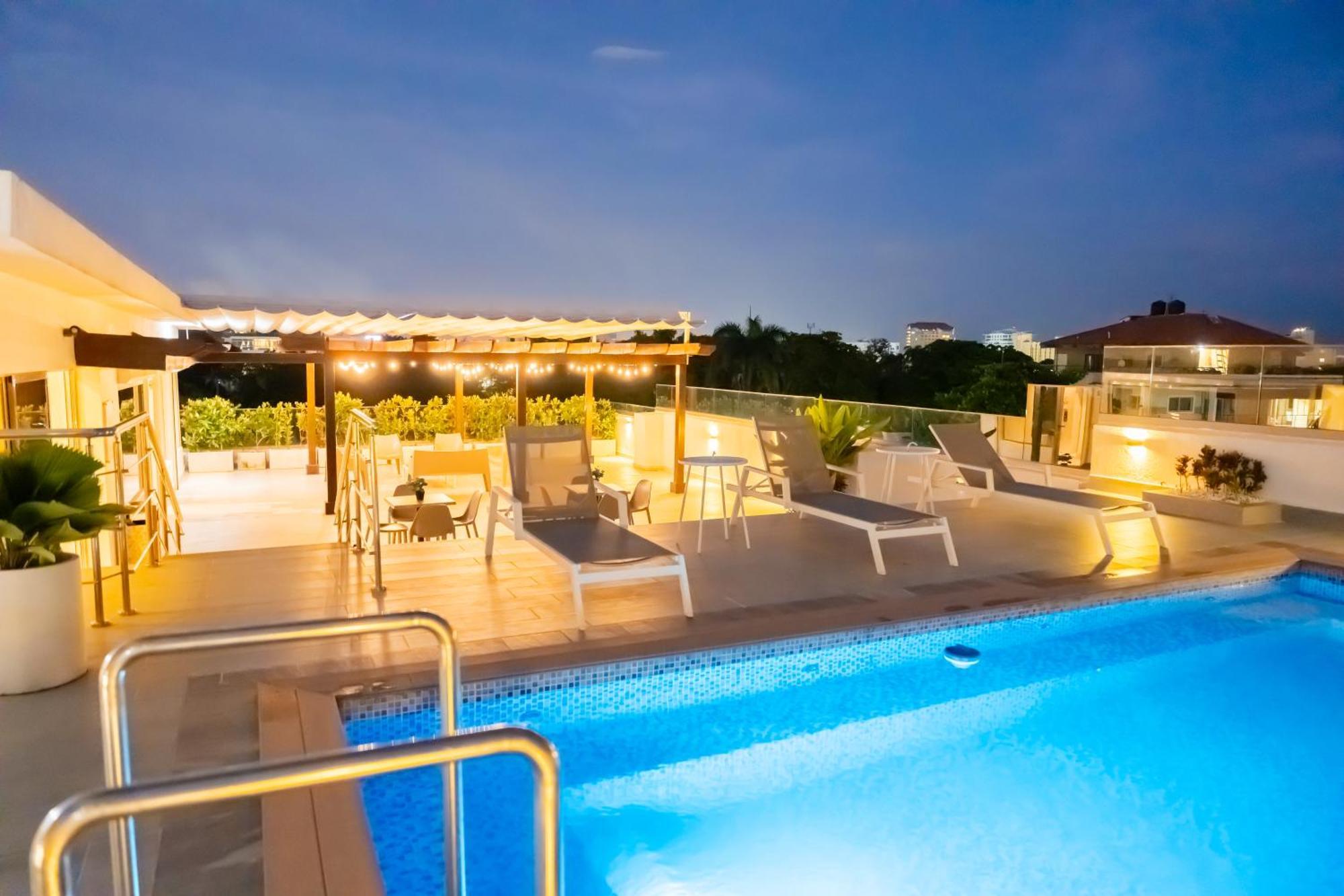 Hotel Stay Here Suites 聖多明哥 外观 照片