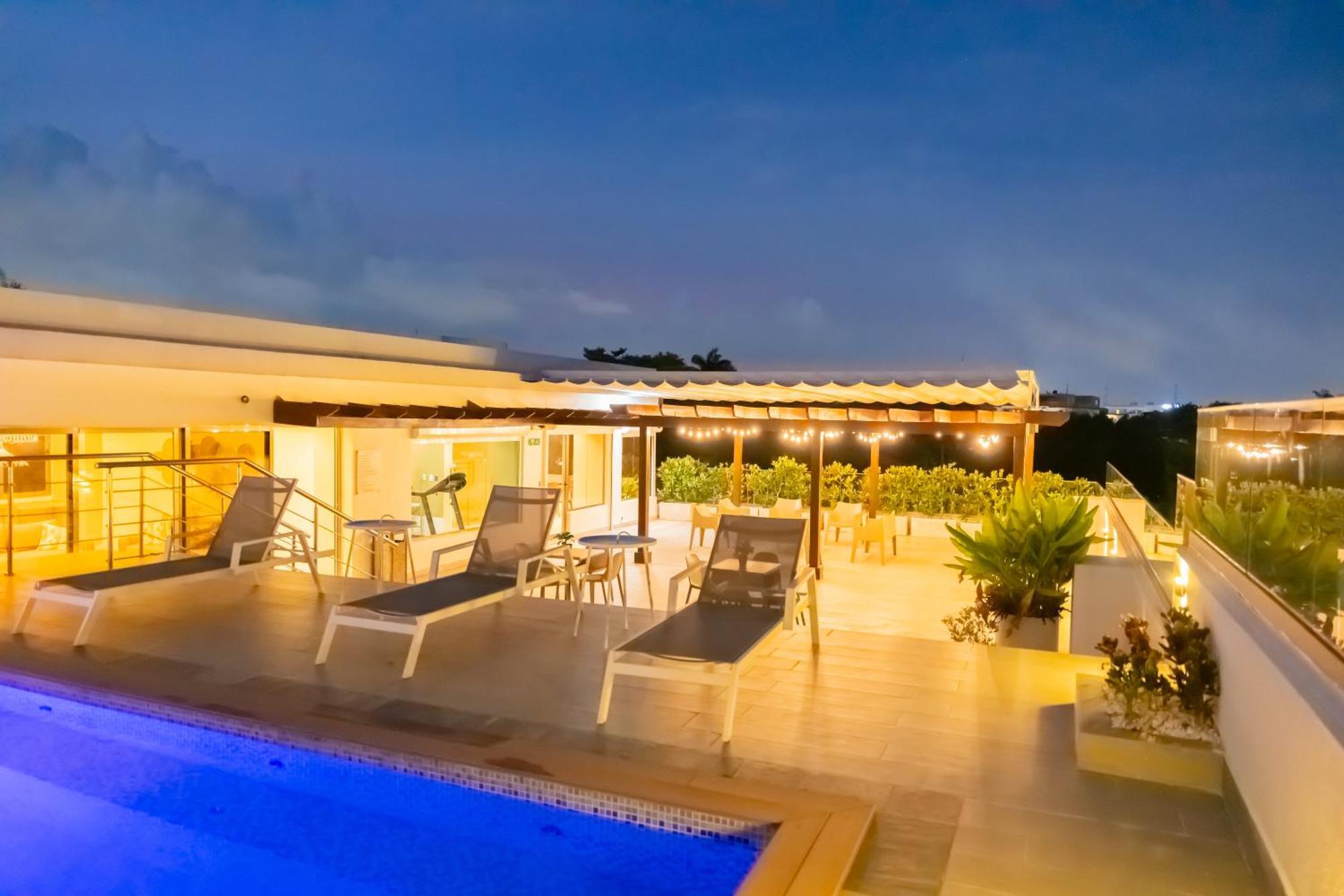 Hotel Stay Here Suites 聖多明哥 外观 照片